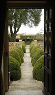 A photograph taken through a doorway at a National Trust property.