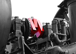 Top of a Steam Engine shown in Black and white with red adjustment.